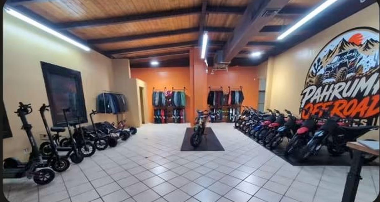 Wide view of the retail floor with bikes and gear